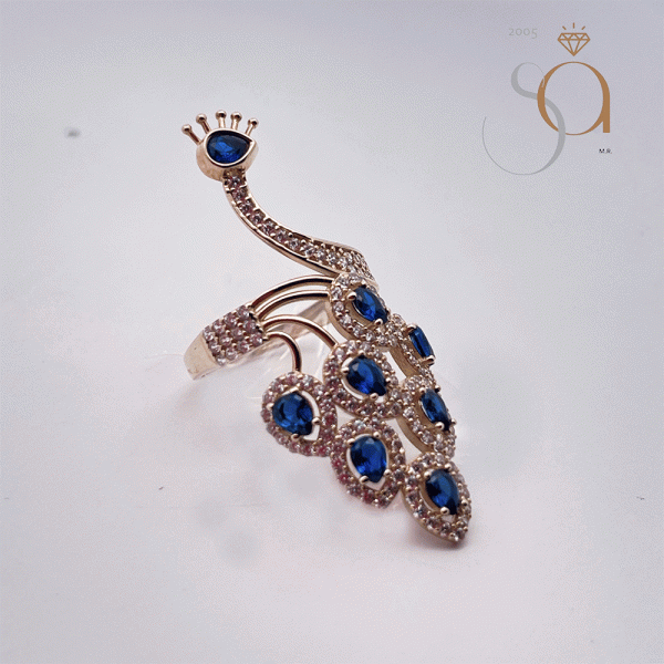 Anillo Pavo Real en Oro 10k Rosa con Cristales Azul Zafiro